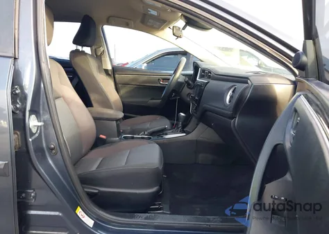 2017 Toyota Corolla Le z USA, uszkodzony, nr VIN 5YFBURHE8HP575868